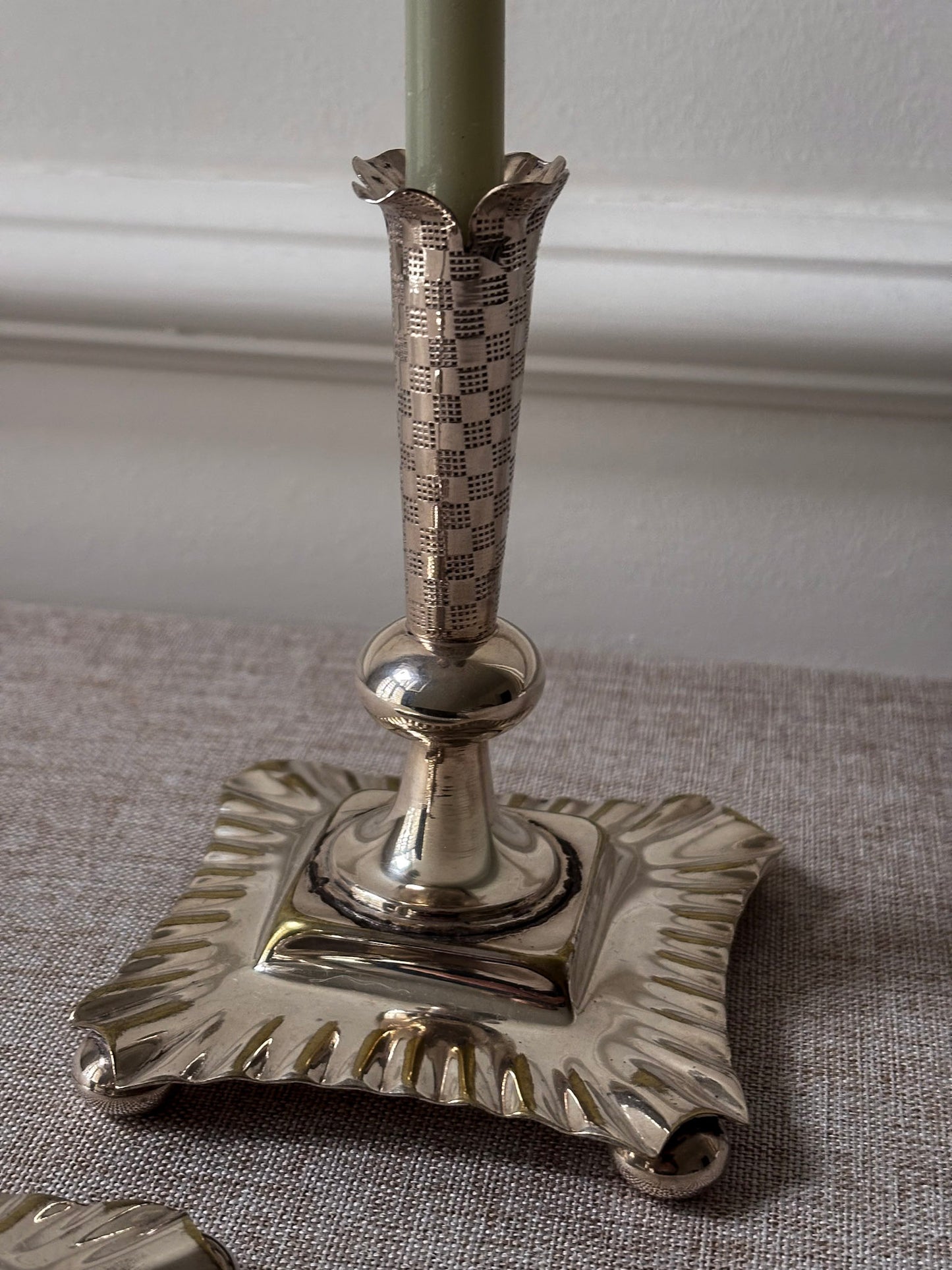 A Pair of Silver-Plated Chequered Candlesticks