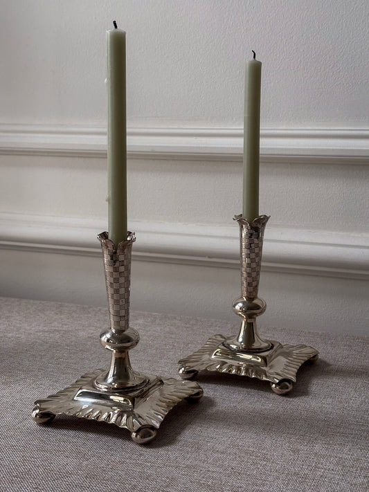 A Pair of Silver-Plated Chequered Candlesticks