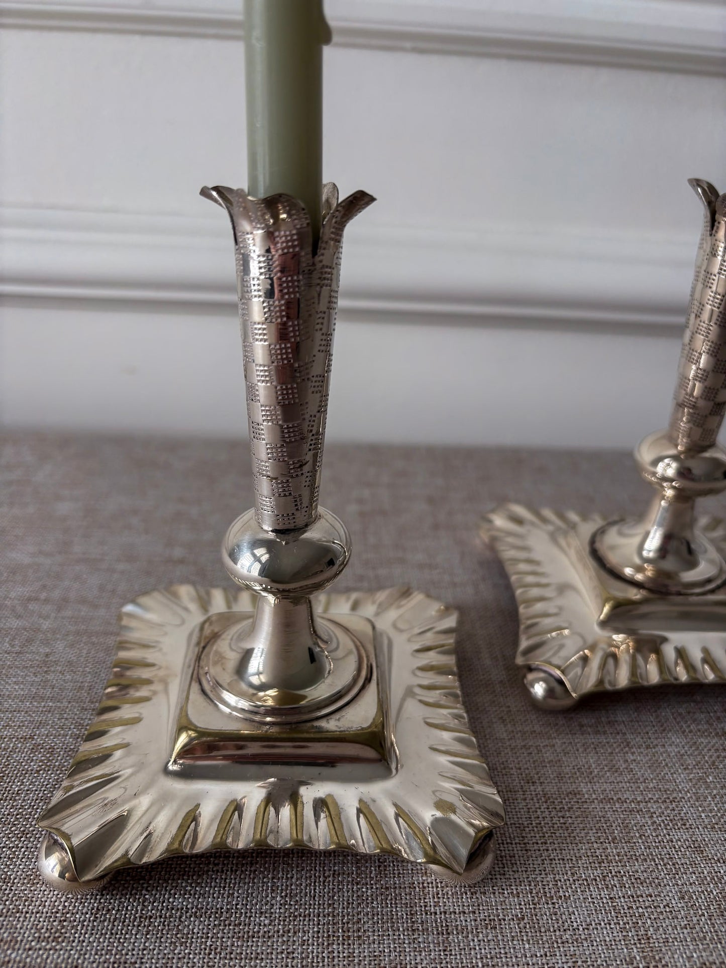 A Pair of Silver-Plated Chequered Candlesticks
