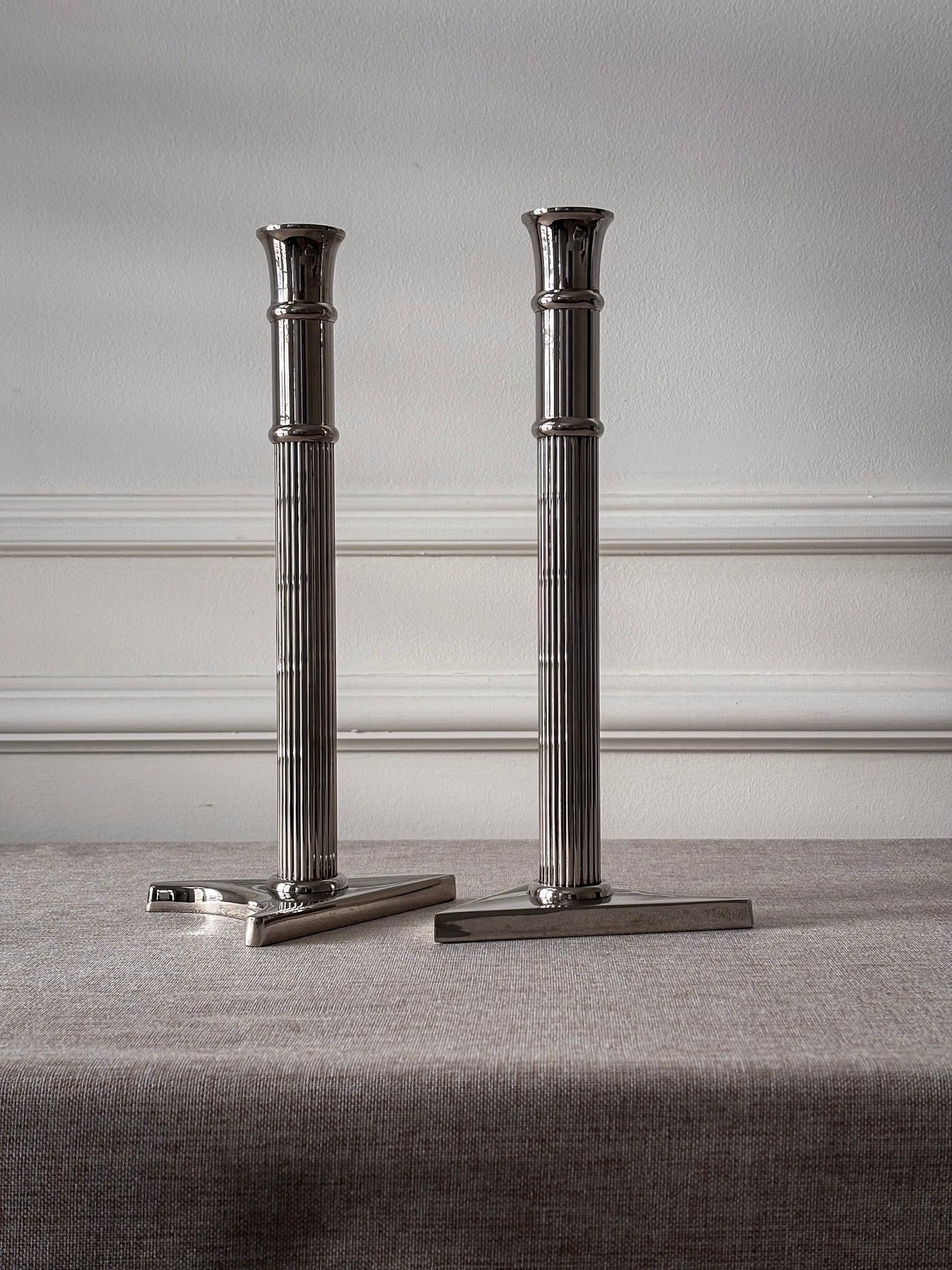 Pair of Silver-Tone Triangular Base Candlesticks